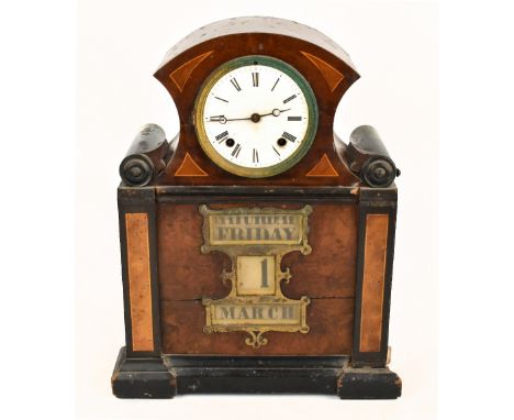 A late 19th/early 20th century German perpetual calendar clock, with enamel Roman numeral dial above apertures for days, date
