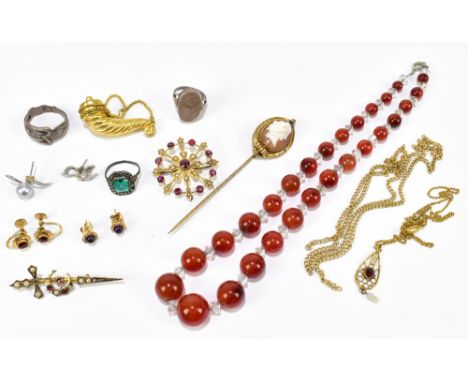 A 9ct gold and garnet and seed pearl set open work brooch pendant, gross weight approx. 4.1g, an orange agate bead necklace, 