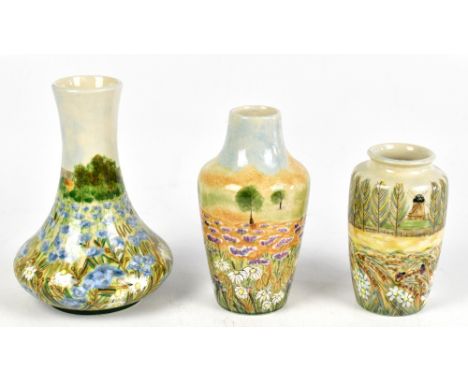 COBRIDGE; three contemporary vases, each with floral decoration including a trial example, height of largest 19cm (3).Additio