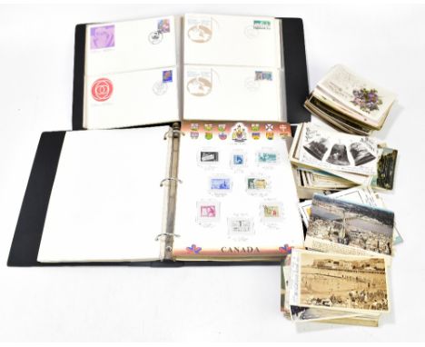 A quantity of assorted postcards, various scenes including Belfast, Liverpool, etc, also an album of First Day covers.