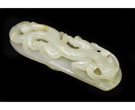 A carved jade group of crawling mythical beast on bridge, raised on circular plinth, length 9cm.Additional InformationOne edg