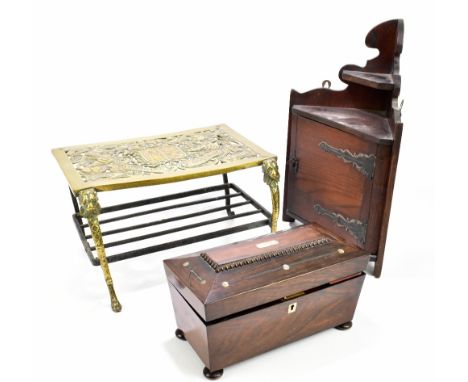 An early 19th century inlaid rosewood sarcophagus shaped tea caddy, length 30cm, a cast brass and wrought iron fire side triv