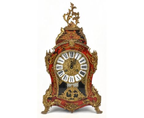 A reproduction Boulle work style mantel clock, with gilt metal surmount, the dial set with Roman numerals, height 57cm, compl