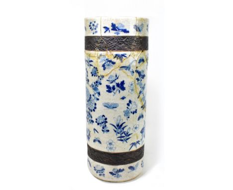 A late 19th century Chinese crackle glaze stick stand, heavily repaired, height 61cm