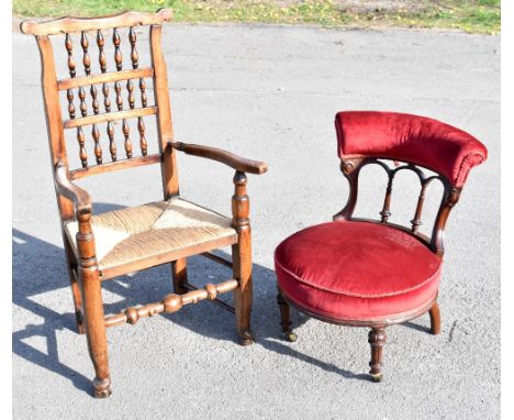 A Victorian mahogany nursing chair, with circular seat, height 69cm, and a ladder back chair (2)