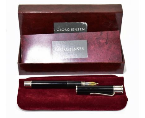 GEORG JENSEN; a silver mounted black fountain pen, in original box with booklet (1)Additional InformationThe pen has been use