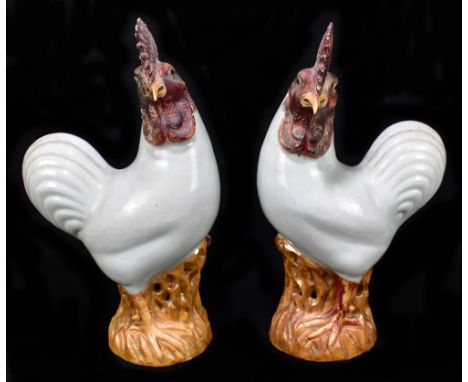 A pair of 18th/19th century part celadon glazed and painted large models of cockerels, height 39cm and 38cm.Additional Inform