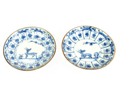 Two Chinese blue and white saucers, possibly Kangxi, decorated with deer, diameter 11cm (2)