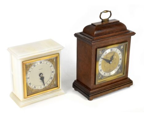 ELLIOT; a 1950s alabaster mantel clock, the silver chapter ring set with Arabic and Roman numerals, marked Finnegan's, height