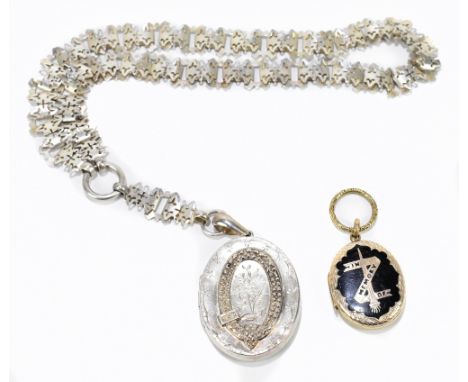 BLANCKENSEE &amp; LEVETUS; a Victorian hallmarked silver locket, on filigree white metal chain, the locket of oval form with 