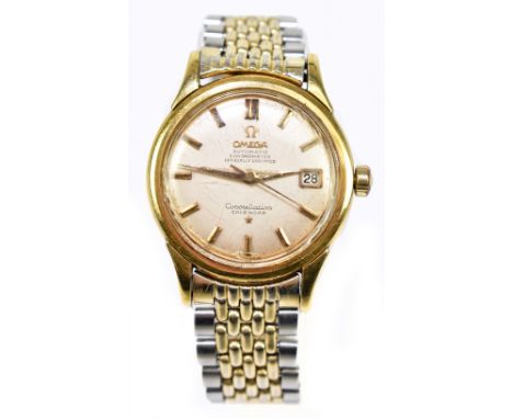 OMEGA; a gentleman’s vintage Constellation calendar wristwatch, with circular dial and two tone bracelet, diameter excluding 