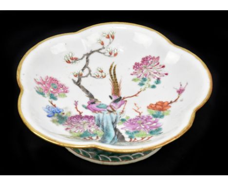 An early 20th century Chinese Famille Rose porcelain footed bowl decorated in enamels with a phoenix and floral detail, with 