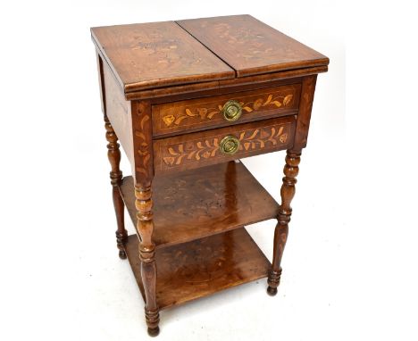 A 19th century Dutch marquetry inlaid mahogany fold over table/stand of square form, with two central drawers above two shelv