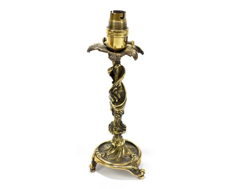 A brass floral decorated electric lamp, height 28cm.&nbsp;
