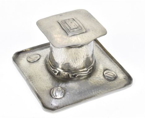 ARCHIBALD KNOX FOR LIBERTY &amp; CO; an English pewter inkwell of square form with relief and planished decoration, impressed