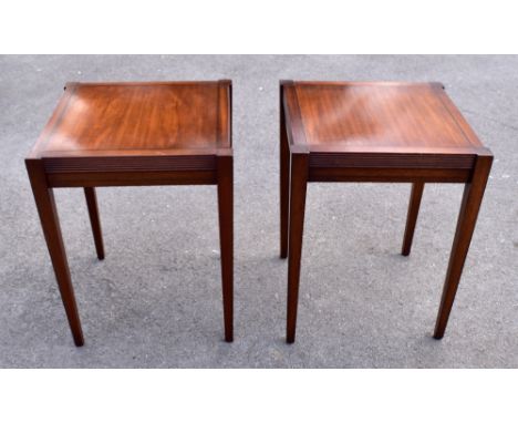 A pair of reproduction mahogany square sectioned side tables raised on tapering legs, height 63cm, width 50.5cm, depth 50.5cm