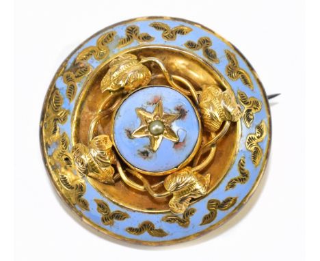 A Victorian yellow metal and blue enamel brooch, with foliate detailing, diameter 3.25cm, in leather box.&nbsp;Additional Inf