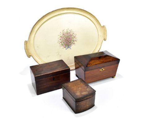 A late Victorian oak tea caddy, the hinged cover enclosing two compartments, on ball feet, width 22cm, and a two further tea 
