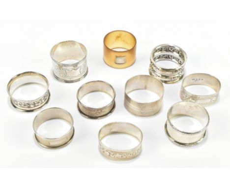 Nine assorted hallmarked silver napkin rings and a further napkin ring, possibly American, stamped 'Silver', weight 5ozt/158g