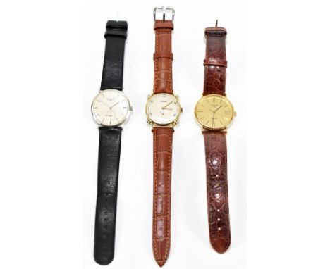 LONGINES; three gentleman's wristwatches including a 14k cased example, the silvered dial set with Roman numerals and subsidi