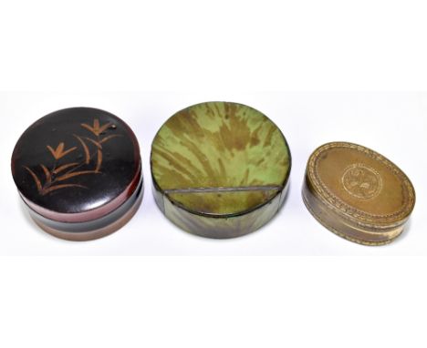A Georgian green tortoiseshell snuff box of circular form, diameter 9cm, together with a brass snuff box and a lacquered box 