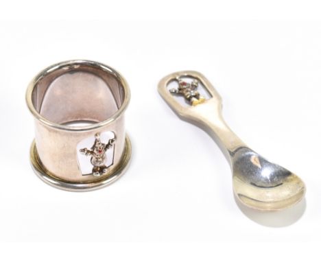 CARRS; a hallmarked silver christening spoon and napkin ring, each cast with a clown, the spoon approx. 9cm (2).