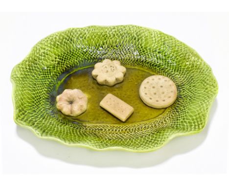 BRETBY; an advertising ceramic tray with ceramic biscuits for Huntley &amp; Palmers, 20 x 26cm.Additional InformationLight we