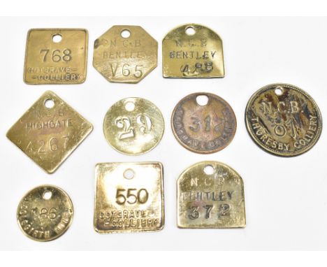 Ten assorted miner's brass lamp checks or tokens (10).