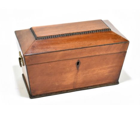 A mahogany sarcophagus shaped three sectioned tea caddy, 27cm x 16cm.&nbsp;