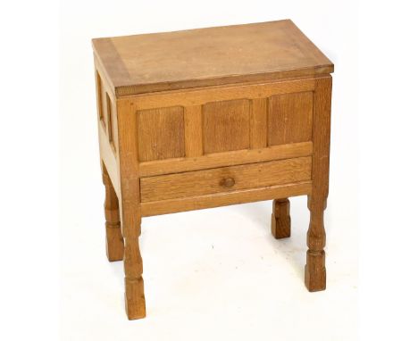 WORKSHOP OF ROBERT MOUSEMAN THOMPSON; an oak workbox, the hinged cover with adzed decoration and panelled front above single 