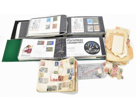 Two albums of first day covers, and an assortment of loose stamps.&nbsp;