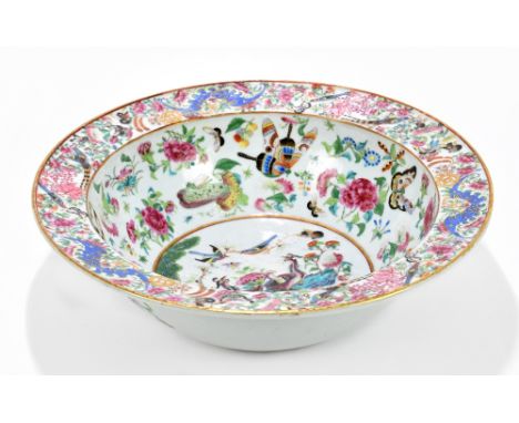 A 19th century Chinese Famille Rose porcelain bowl of circular form, decorated in enamels with exotic birds and floral motifs
