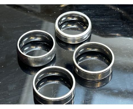 2 Titanium rings together with 1 Cobalt ring & 1 stainless steel ring 