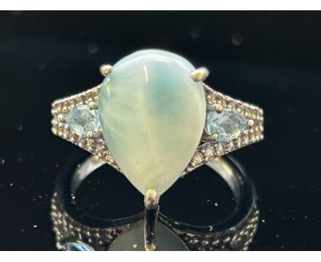 Ladies silver & blue stone dress ring 