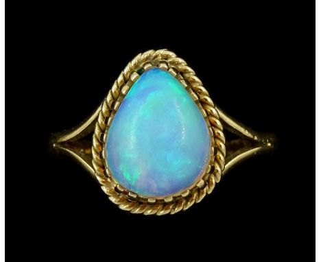 9ct gold single stone pear cut opal ringCondition Report:Approx 3.1gm, size O, head length = 13mm, some very light rubbing to