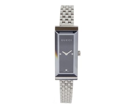 Gucci stainless steel quartz ladies wristwatch, Ref 127.5, black dial with diamond hour markers at 3, 6 and 9 o'clock, boxed 