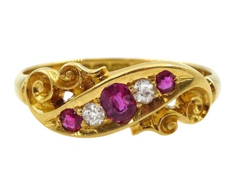 Edwardian 18ct gold five stone ruby and diamond ring, in navette and pierced scroll design setting, Birmingham 1904, in box b