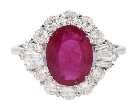 18ct white gold oval cut ruby, round and baguette cut diamond cluster ring, stamped 750, ruby 1.78 carat, total diamond weigh