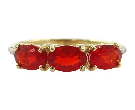 9ct gold three stone oval fire opal ring, with diamond shoulders, hallmarked Condition Report:Approx 1.8gm, size N-O