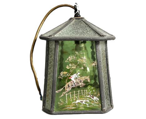 An early 20th c. leaded glass hall lantern with pagoda style top over tapering body with hunting scenes to two sides, 24 cm.
