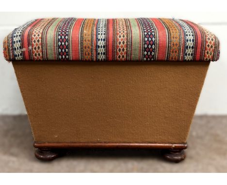 A 19th c. commode / stool, with later kilim removable top on sarcophagus shaped body and bun feet, 42 x 60 x 44 cm.&nbsp;