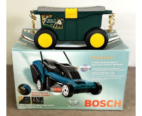 A Bosch Rotak 40 lawnmower, along with garden tool box on wheels with quantity of tools, (A Lot).&nbsp;