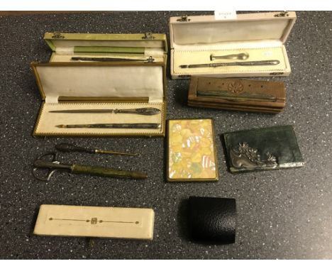 Boxed silver pens , button hooks etc.