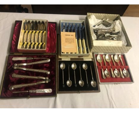 Boxed teaspoons, a nutcracker set, silver flatware and a vesta