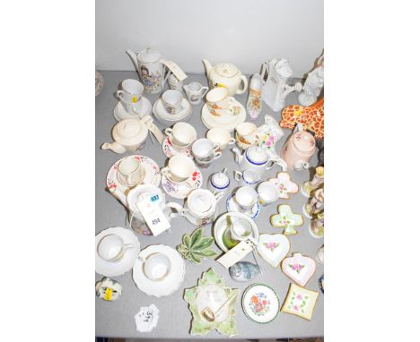Miscellaneous ceramics, to include: miniature cups and saucers, trinket dishes, tea cups, ornaments and a quantity of figures