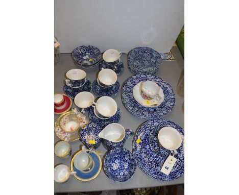 A Burleigh 'Calico' pattern part dinner and tea service, to include: dinner plates, side plates, supper plates, tea cups and 