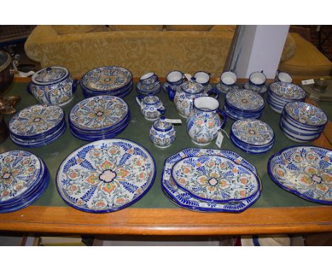 A Majolica part dinner and tea service, by Uriarte Talavar, Puebla, Mexico, to include: meat dishes, teapot, jug, dinner plat