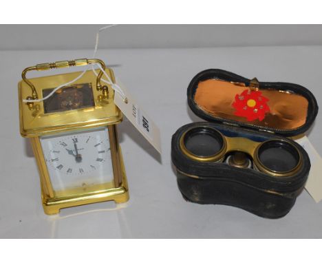 Modern Bayard eight day carriage clock with bevelled glass and visible escapement, in brass case; together with a pair of ope
