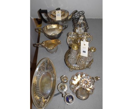 Silver plated ware, to include: a Victorian three-piece tea set, no. 02326; an egg cruet; a seven bar toast rack, by Walker &