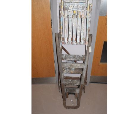 A pair of wooden folding step ladders; and a wooden sack barrow.  (2)